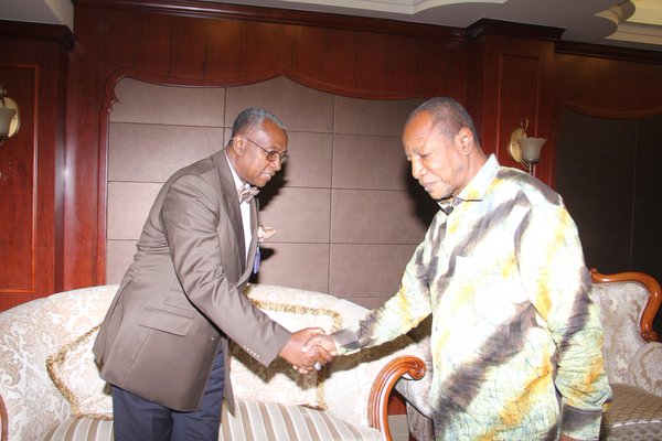 Alpha Condé et Ghandi Faraguet Tounkara