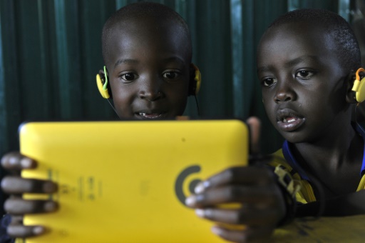 Des élèves dans une école de Kawangare, à Nairobi le 16 octobre 2015 | AFP/Archives | SIMON MAINA -
