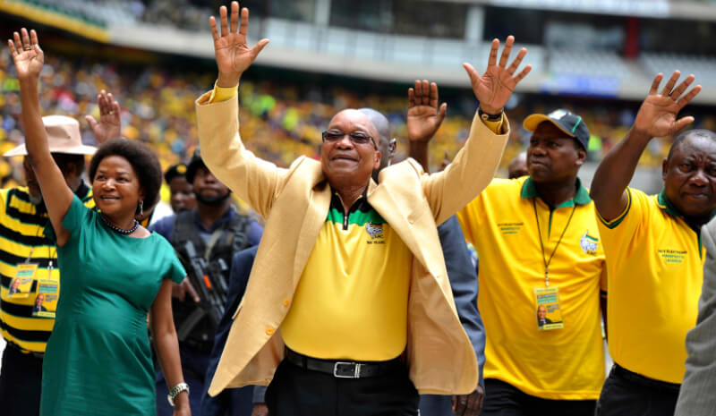 South Africa's President Zuma greets his supporters as he arrives for the launch of his party's election manifesto in Nelspruit
